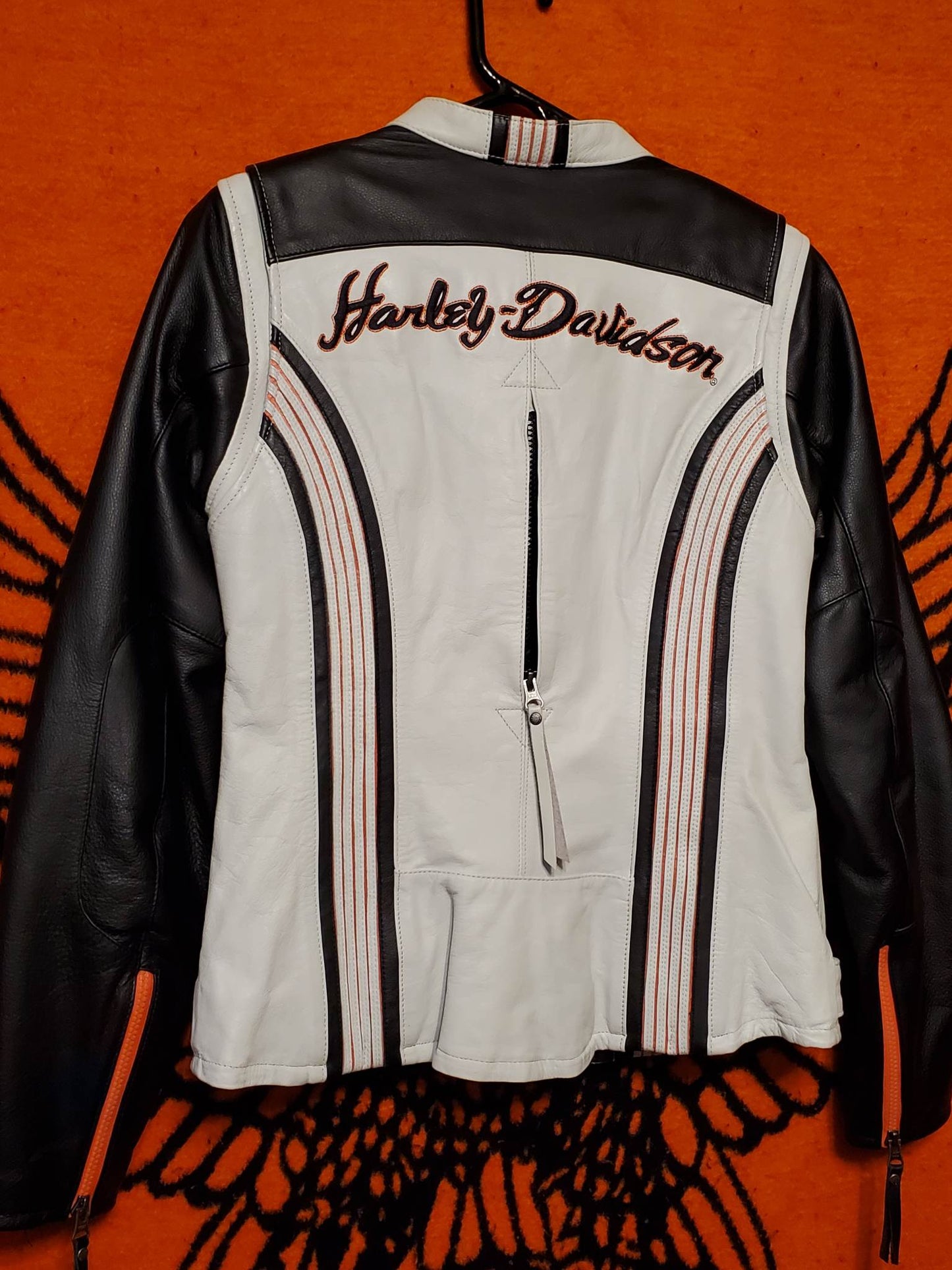 Ladies Harley Davidson leather jacket, super cute, NEW with tags, size medium.